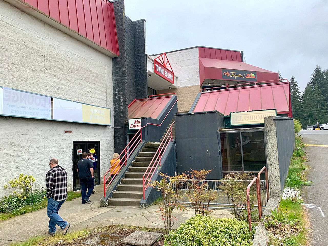 The stairway and exterior wall are to be removed to make way for a grand staircase leading to the mall parking lot. Co-owner Kane Fenner says the stairway is to be completed in “the coming years.” (Bob Smith | Kitsap News Group)