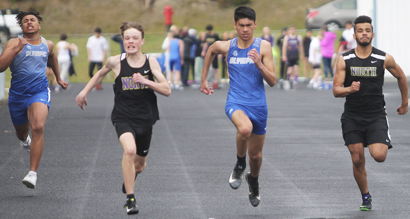 Vikings Luke Ryan and Natheng Toney race to the finish line of the 100 meters at a recent track meet. Steve Powell/File photos