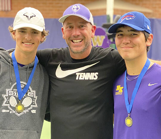 State champs Josh Smith and Drake Jones with coach Jay DeVries in the middle. Courtesy Photo