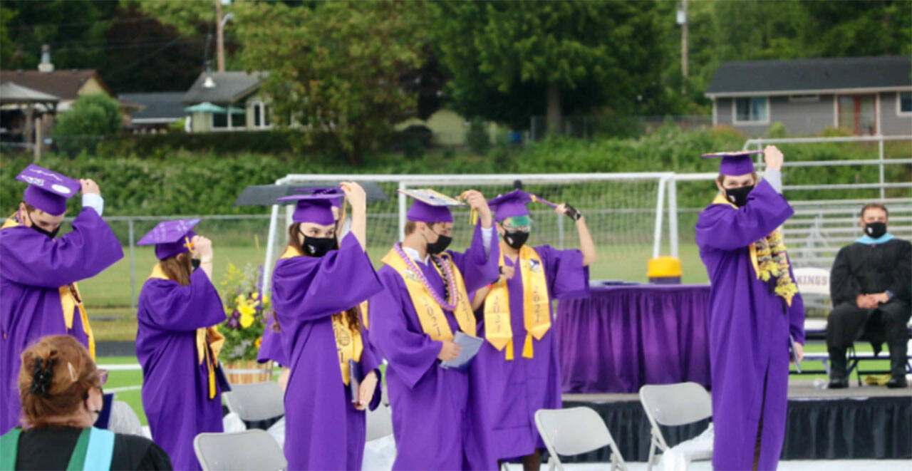 Graduates wore masks and social distanced at last year’s North Kitsap ceremony due to COVID-19 concerns. File Photos
