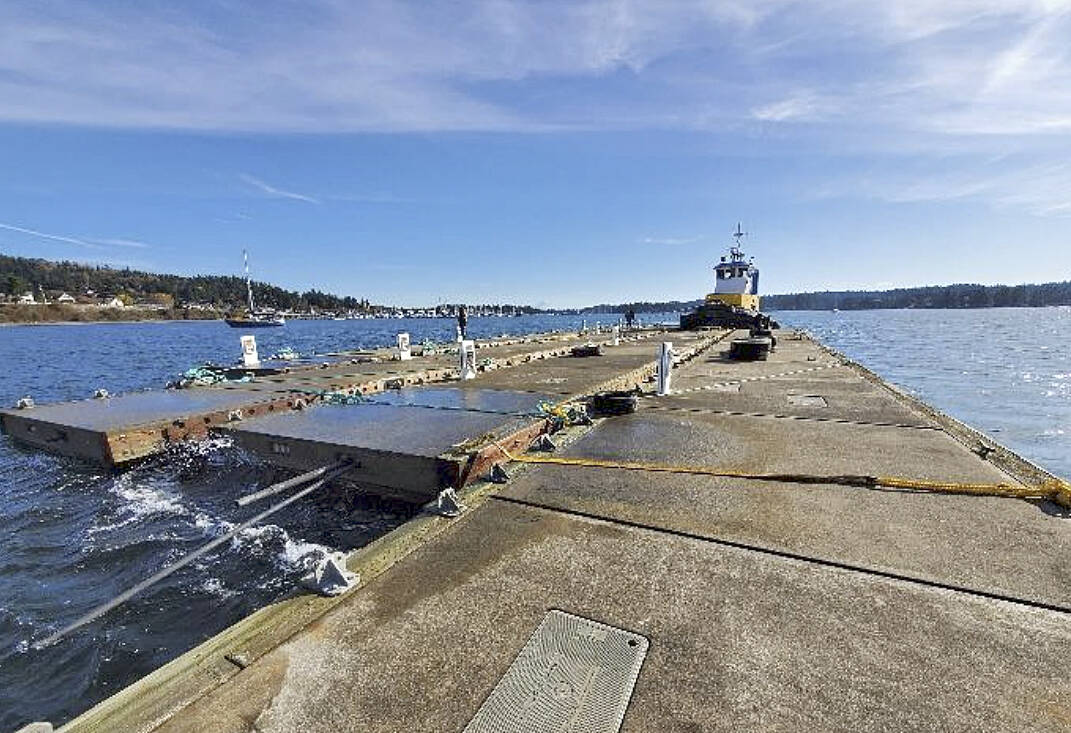 The donated concrete floats were towed to the Port of Poulsbo for complete refurbishment and reuse in the new floating breakwater. Courtesy Photo