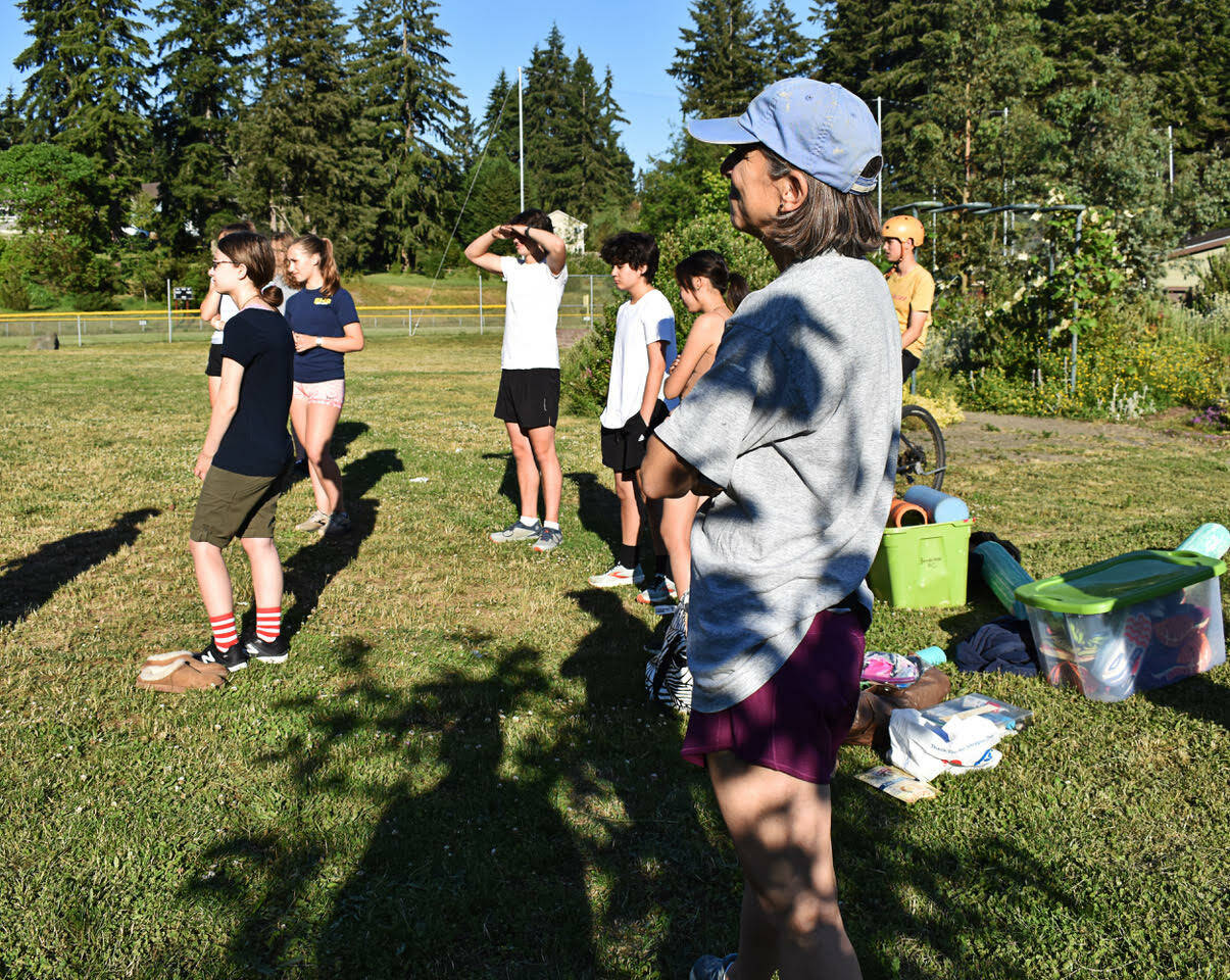 Bainbridge High School's cross country coach Dana Amore was one of the first women to compete for University of Michigan's women's track team. Nicholas Zeller-Singh/Kitsap News Group Photos
