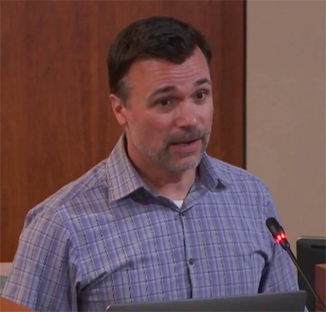 Kitsap County parks director Alex Wisniewski speaks about the Port Gamble Forest Heritage Park framework at the July 11 county commissioners meeting. Courtesy Photo