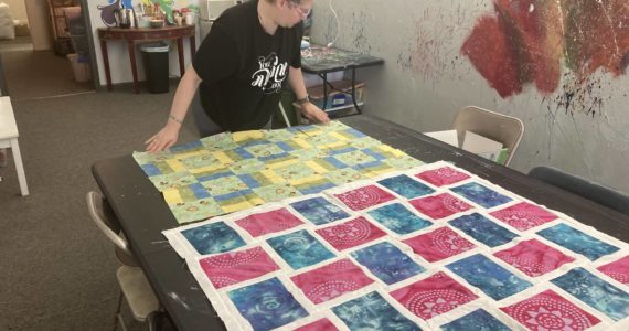 Elisha Meyer/
Port Orchard Independent Photos
Heather Nolm displays some of the quilt patterns.