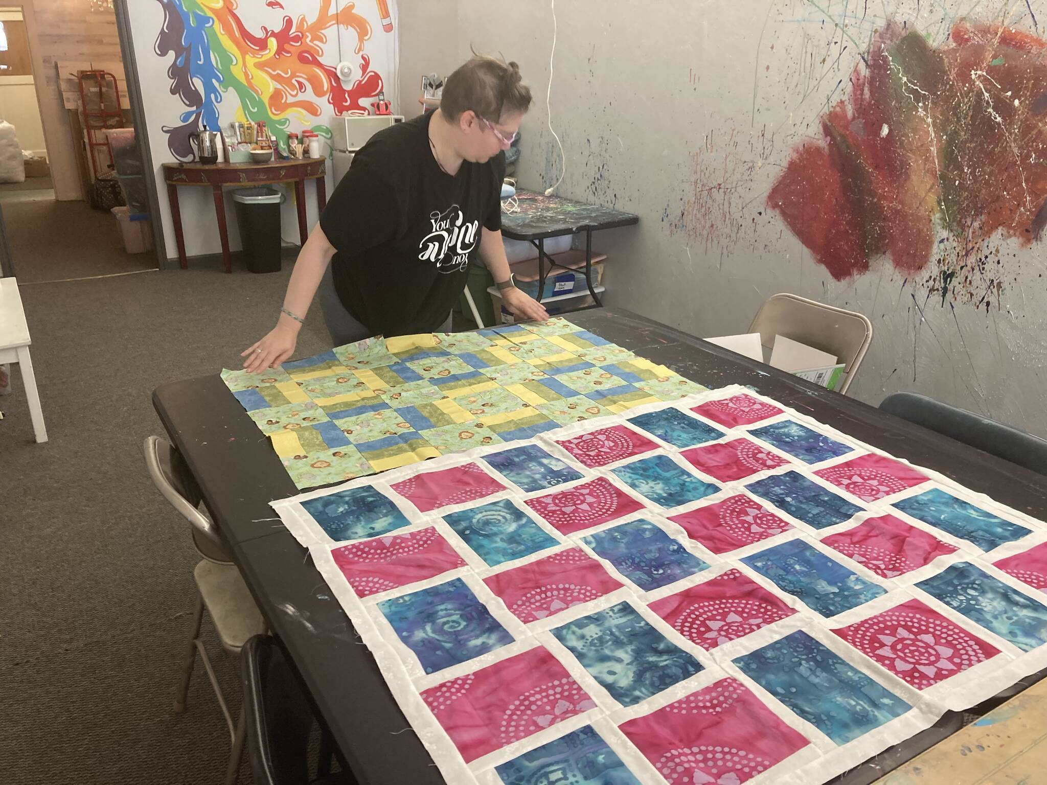 Elisha Meyer/
Port Orchard Independent Photos
Heather Nolm displays some of the quilt patterns.