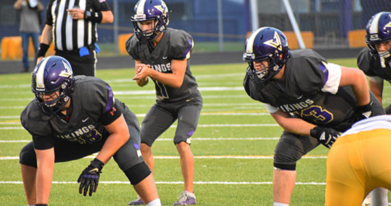 Cole Edwards led the North Kitsap Vikings to their final touchdown with a handful of passes and quarterback runs. Nicholas Zeller-Singh/North Kitsap Herald Photos