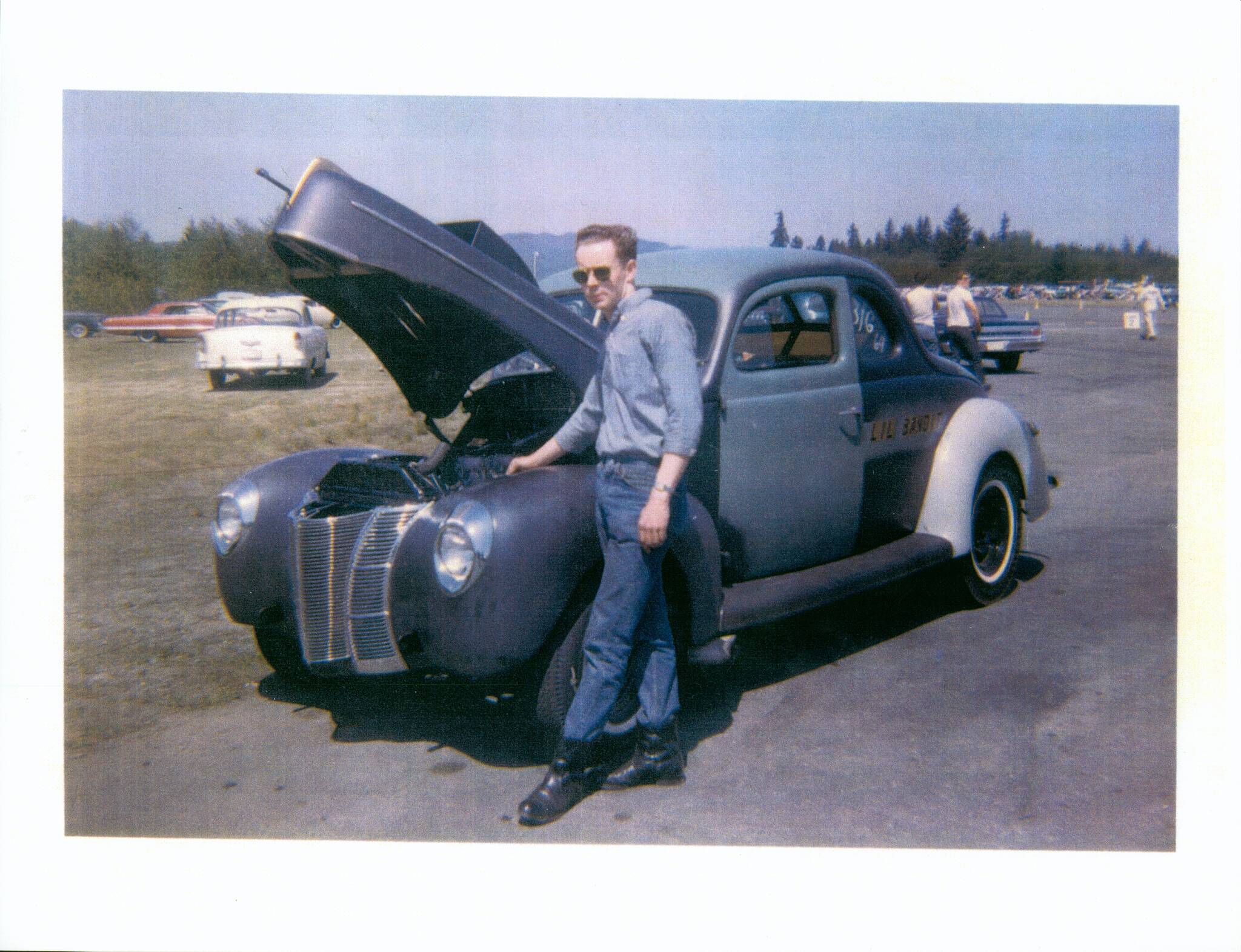 Barker with one of his 1940 Ford Coupe cars. Courtesy Photos