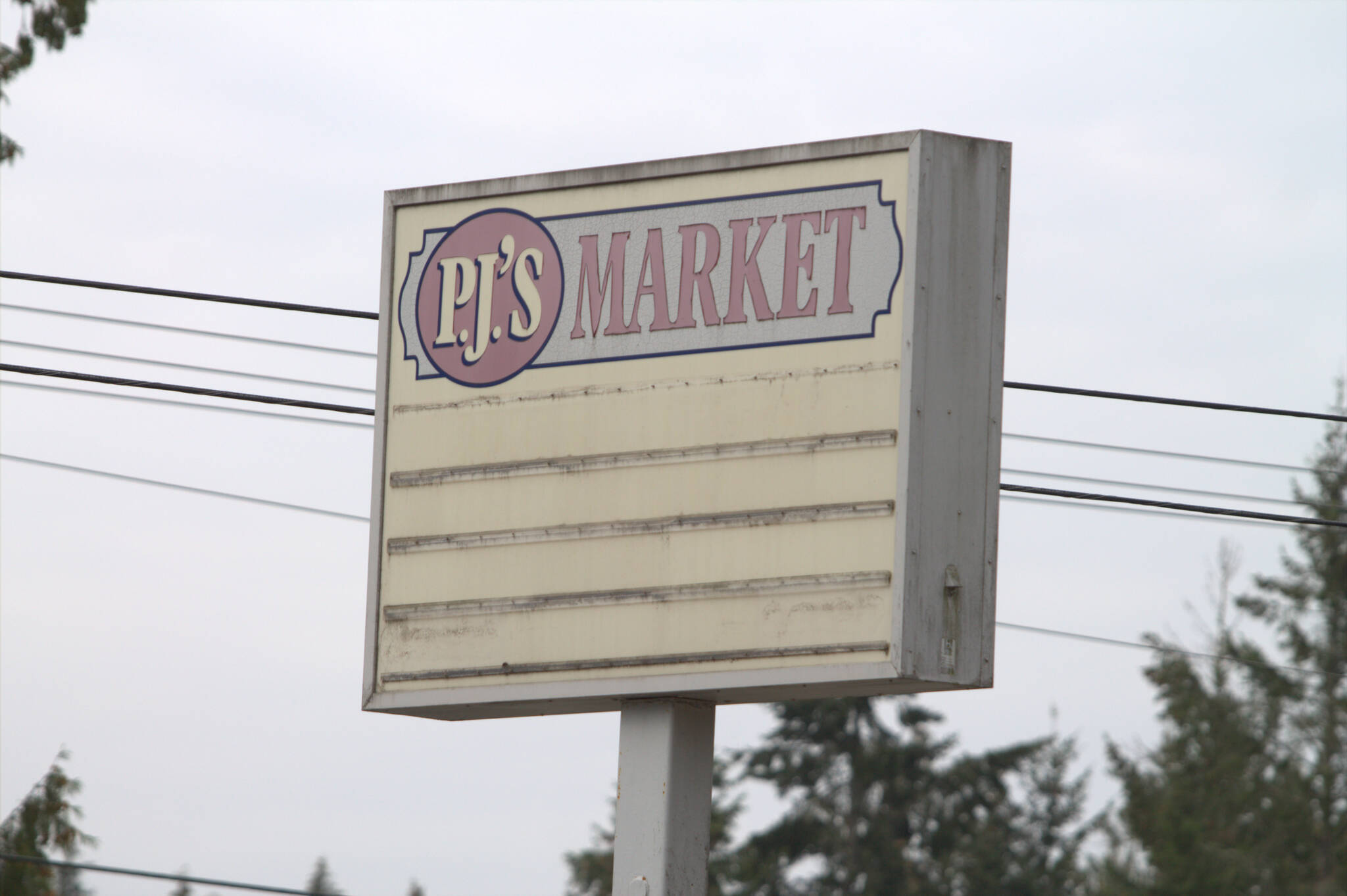 Elisha Meyer/Port Orchard Independent
The old PJ’s Market Sign is still standing during the demolition process.