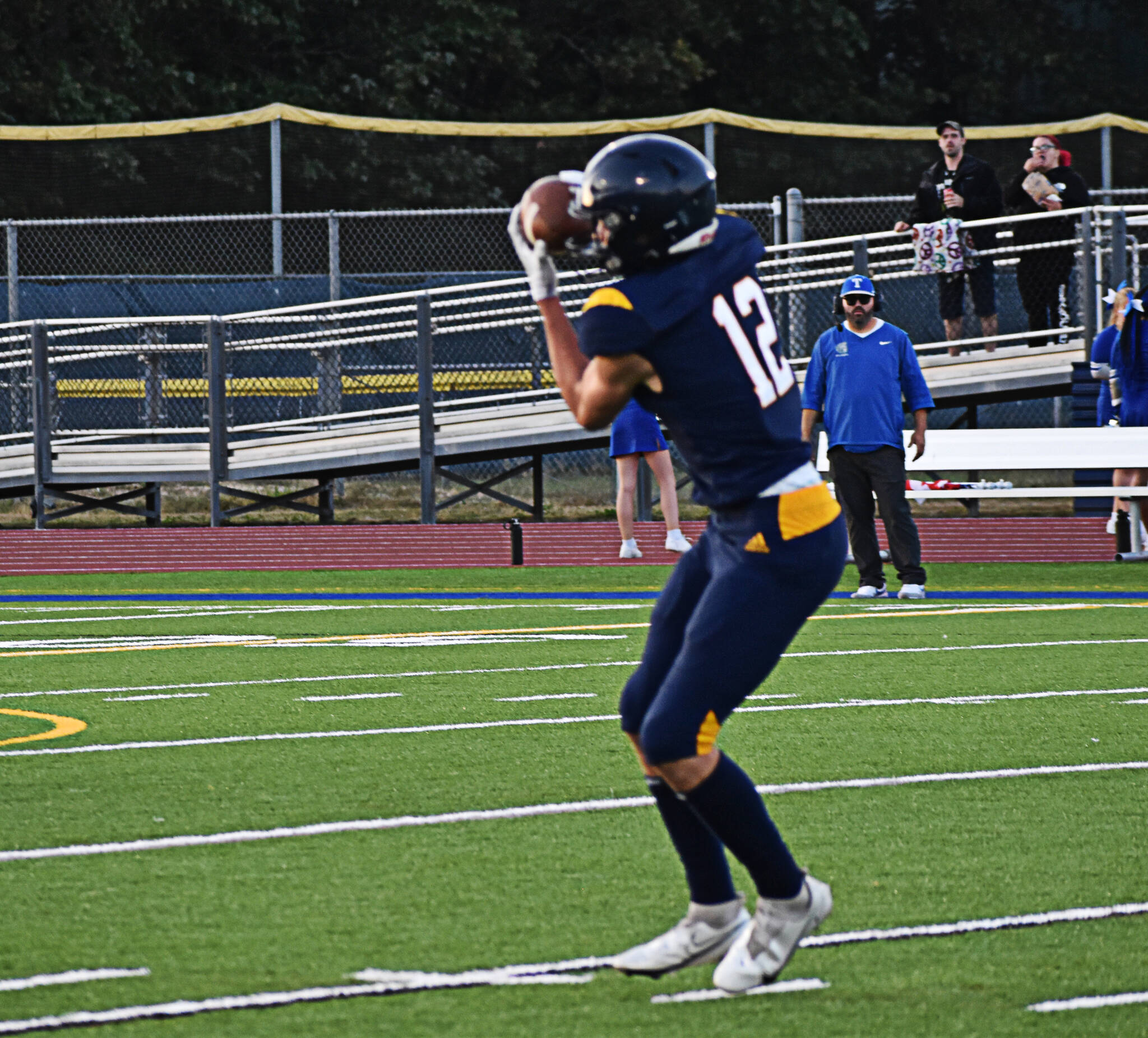 Bainbridge’s tight end Luca Scheltens moves the ball downfield after catching the pass from Jack Grant.