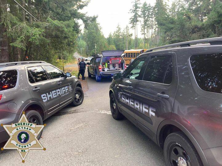 Officers on scene at the intersection of SW Sidney and Spruce. The school bus involved in the wreck can be seen in the background. Courtesy Photo