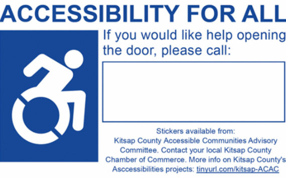 A blue and white sticker reads "Accessibility for All" with a blank rectangle where a phone number can be written so those who need help opening a door can call for assistance. Courtesy Photo