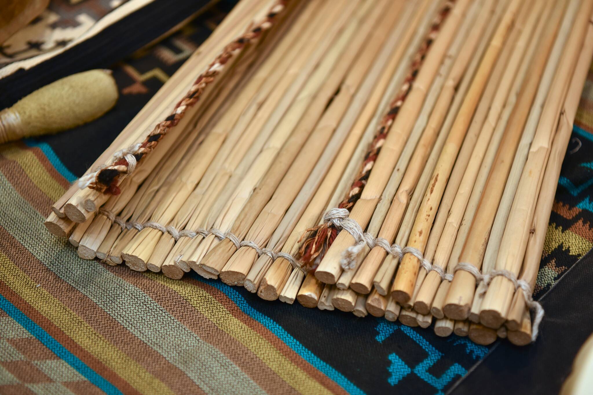 A mat made from tule reeds woven by Ed Carriere.