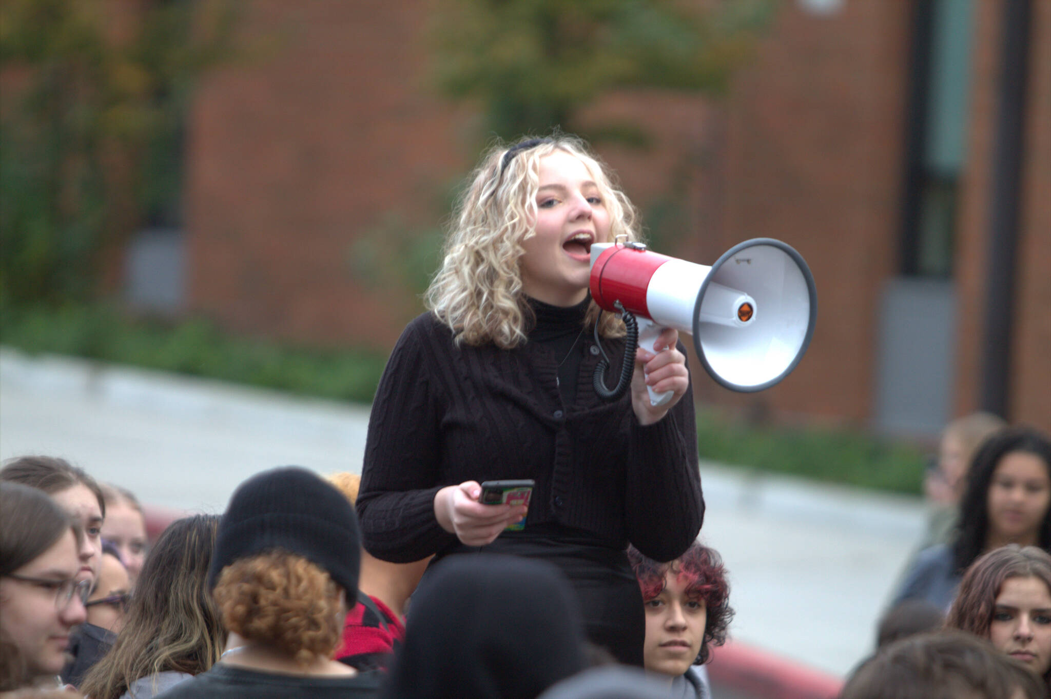 Central Kitsap High School student Cailey Wallace speaks to the crowd of students. Elisha Meyer/Kitsap News Group Photos