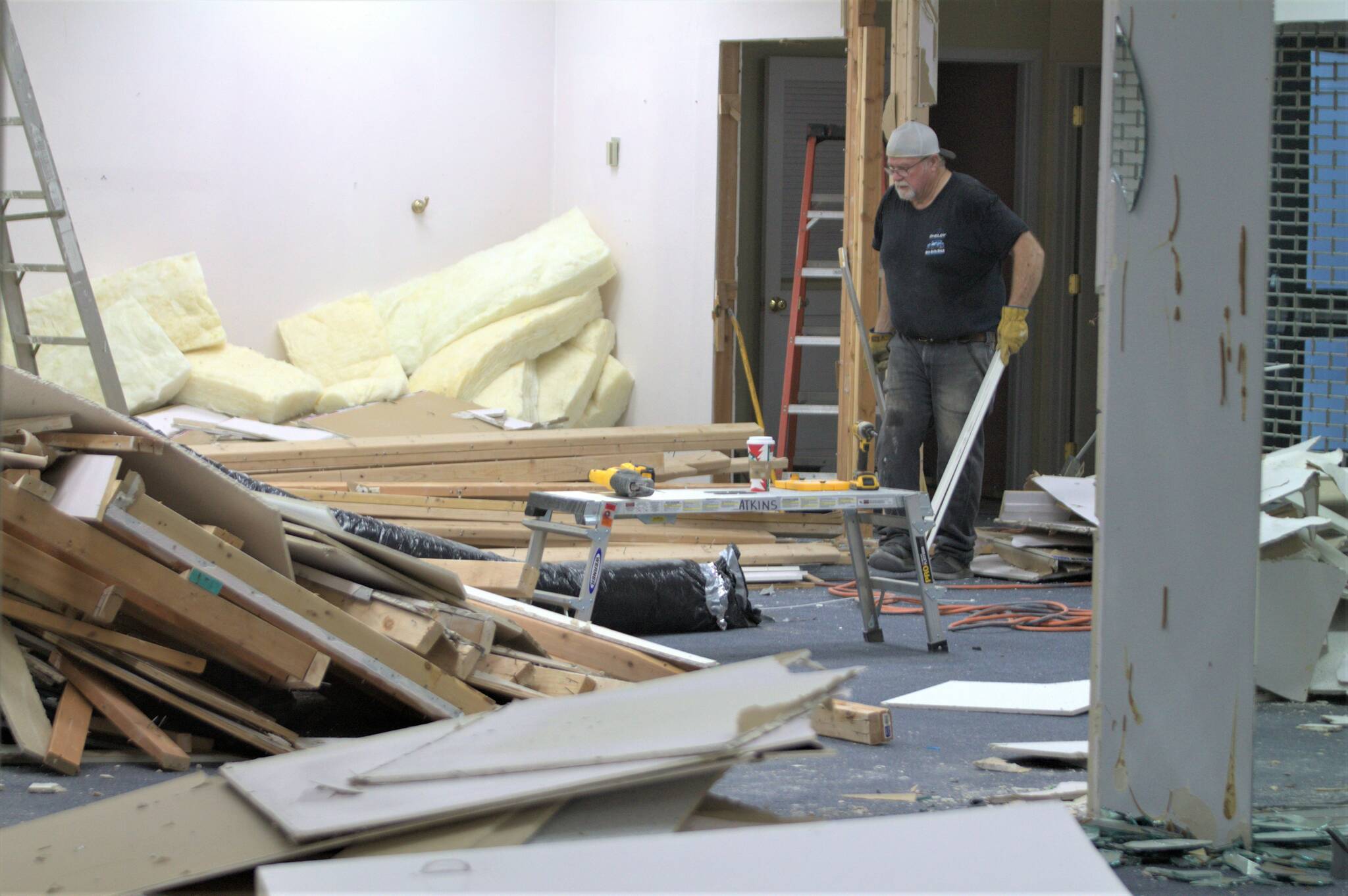 A construction worker puts things together for a new tenant inside the Port Orchard mall. Elisha Meyer/Kitsap News Group Photos