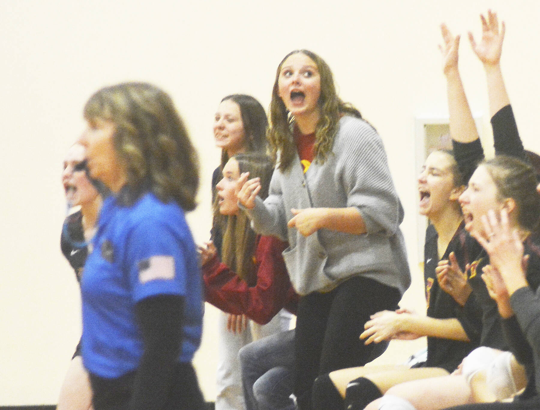 The Kingston bench cheers on its teammates as it came close to winning the second set. Steve Powell/Kitsap News Group Photos