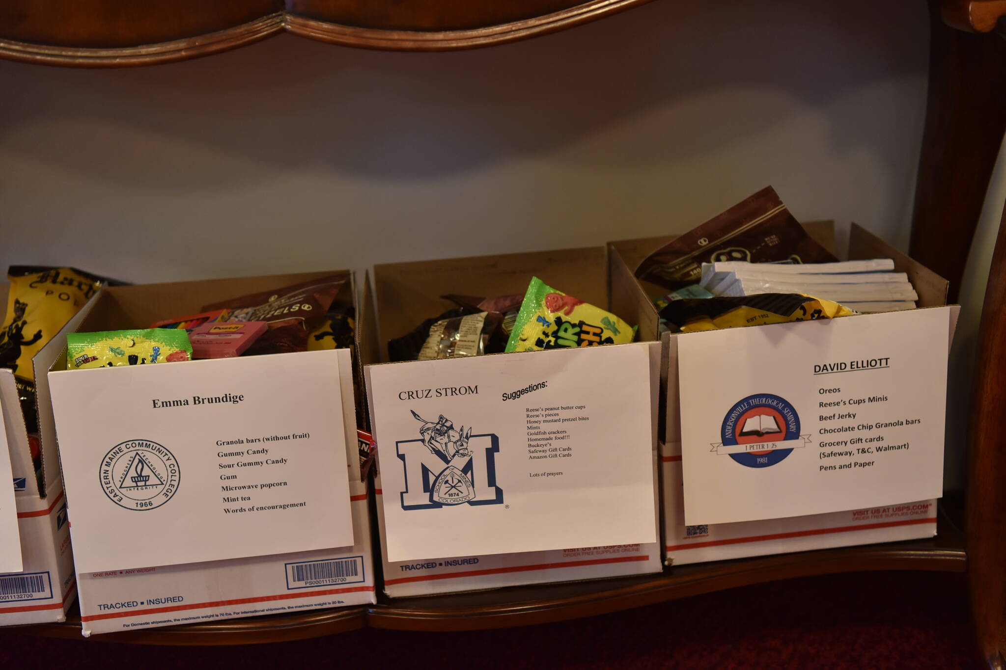 Care packages destined for college students await for final items before shipping.