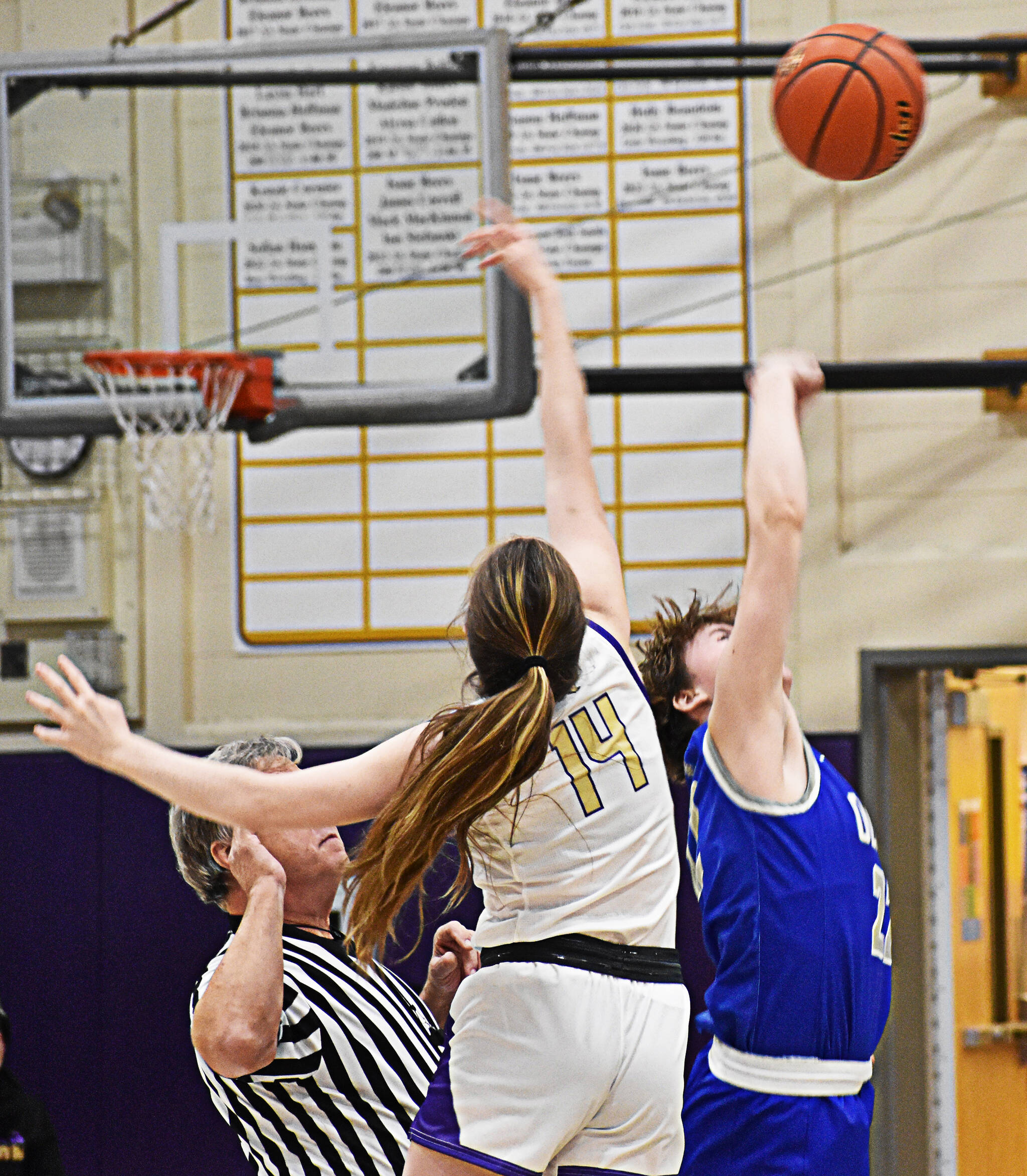 Gabriella Resser and Sophia Baugh jump for the opening tip-off.