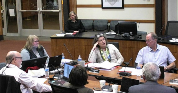 The Poulsbo City Council, assistant city administrator Deb Booher and Mayor Becky Erickson discuss the 2023-24 biennial budget at its meeting Dec. 7. Courtesy Photo