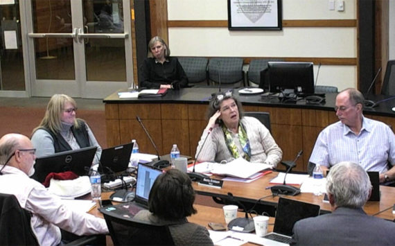 The Poulsbo City Council, assistant city administrator Deb Booher and Mayor Becky Erickson discuss the 2023-24 biennial budget at its meeting Dec. 7. Courtesy Photo