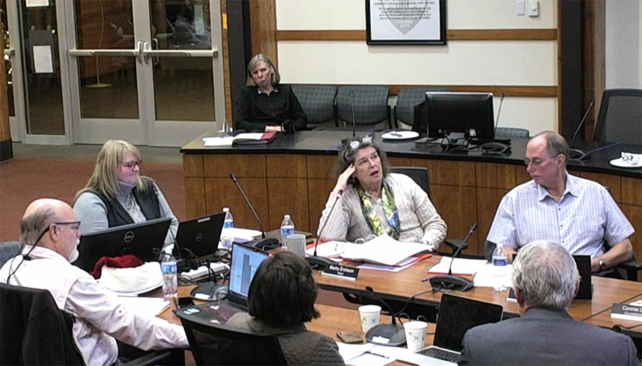 The Poulsbo City Council, assistant city administrator Deb Booher and Mayor Becky Erickson discuss the 2023-24 biennial budget at its meeting Dec. 7. Courtesy Photo