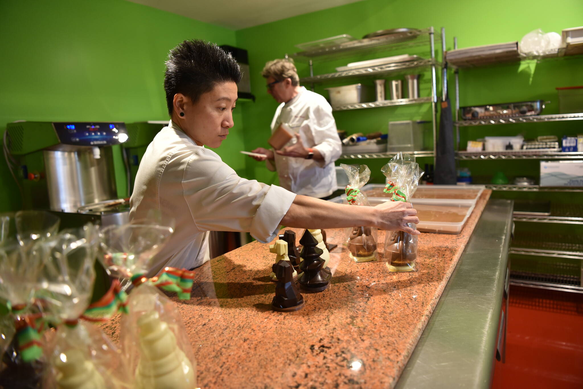 Pastry chef Tae Tran and Chef Tamas Ronyai make chocolates at their newly opened chocolate shop, L’Atelier TR, located on Winslow Way. Nancy Treder/Kitsap News Group Photos
