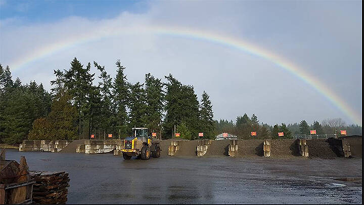 The lot at Vern's with a rainbow overhead.