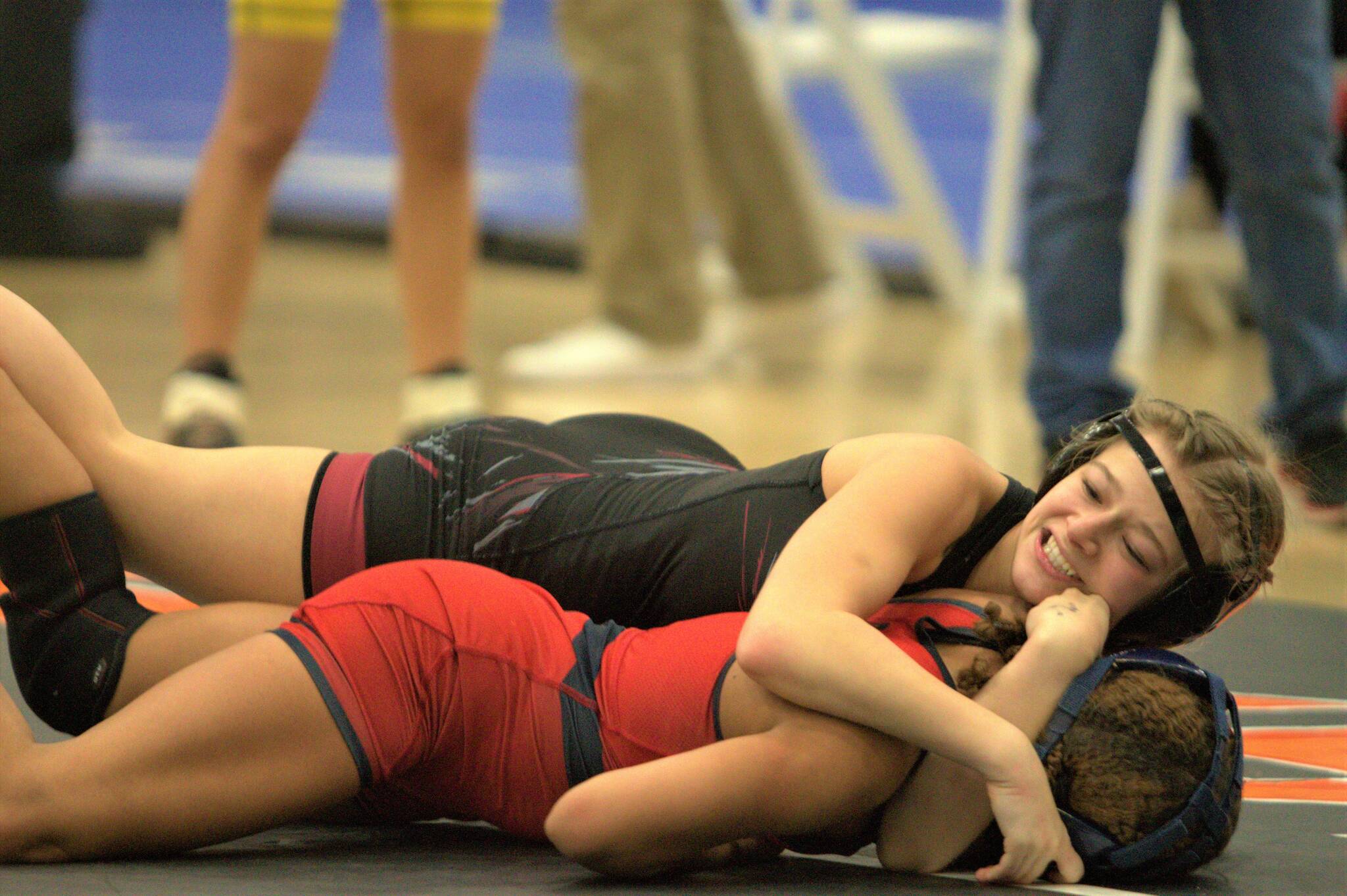 Elisha Meyer/Kitsap News Group Photos 
SK sophomore Tayla Abundis tries to keep her opponent on the mat in the first round of a tournament.