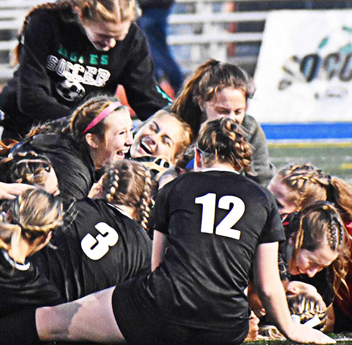 file photos
The Klahowya girls soccer team celebrates after winning the state title this year.
