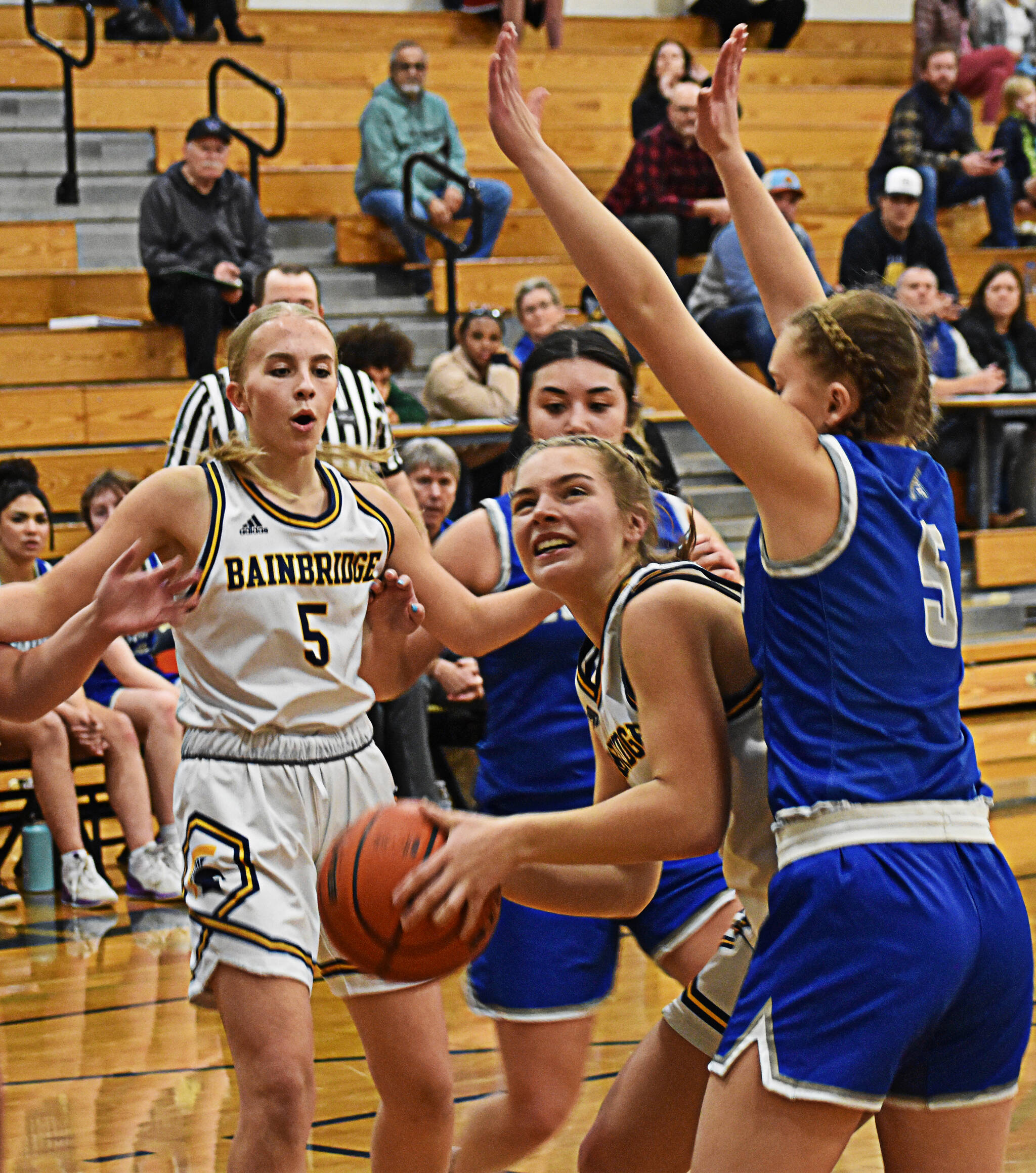 Bella Ramirez and the Spartans survive an Olympic comeback by defeating the Trojans 36-31. Nicholas Zeller-Singh/Kitsap News Group Photos