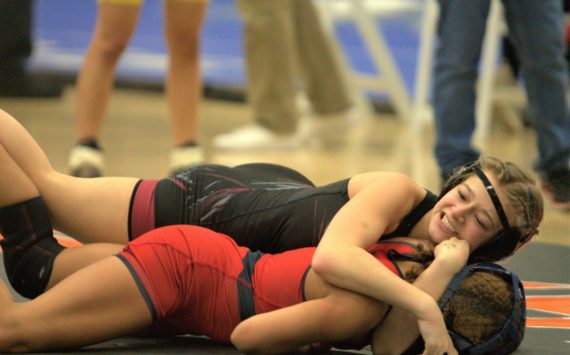 Elisha Meyer/Kitsap News Group Photos
Alexis Scott tries to keep her opponent on the mat in the first round of a tournament.