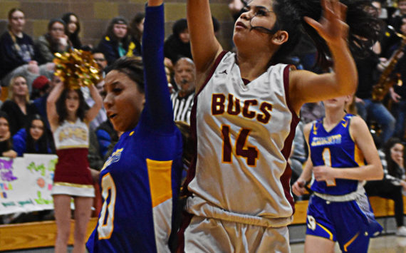 Tatiana Fontes-Lawrence makes a tough basket underneath the hoop to end a dry spell for Kingston. Nicholas Zeller-Singh/Kitsap News Group Photos