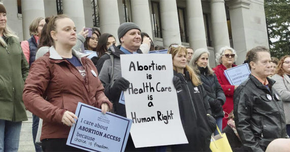 Protesters at the state capitol in Olympia. WNPA Courtesy Photo