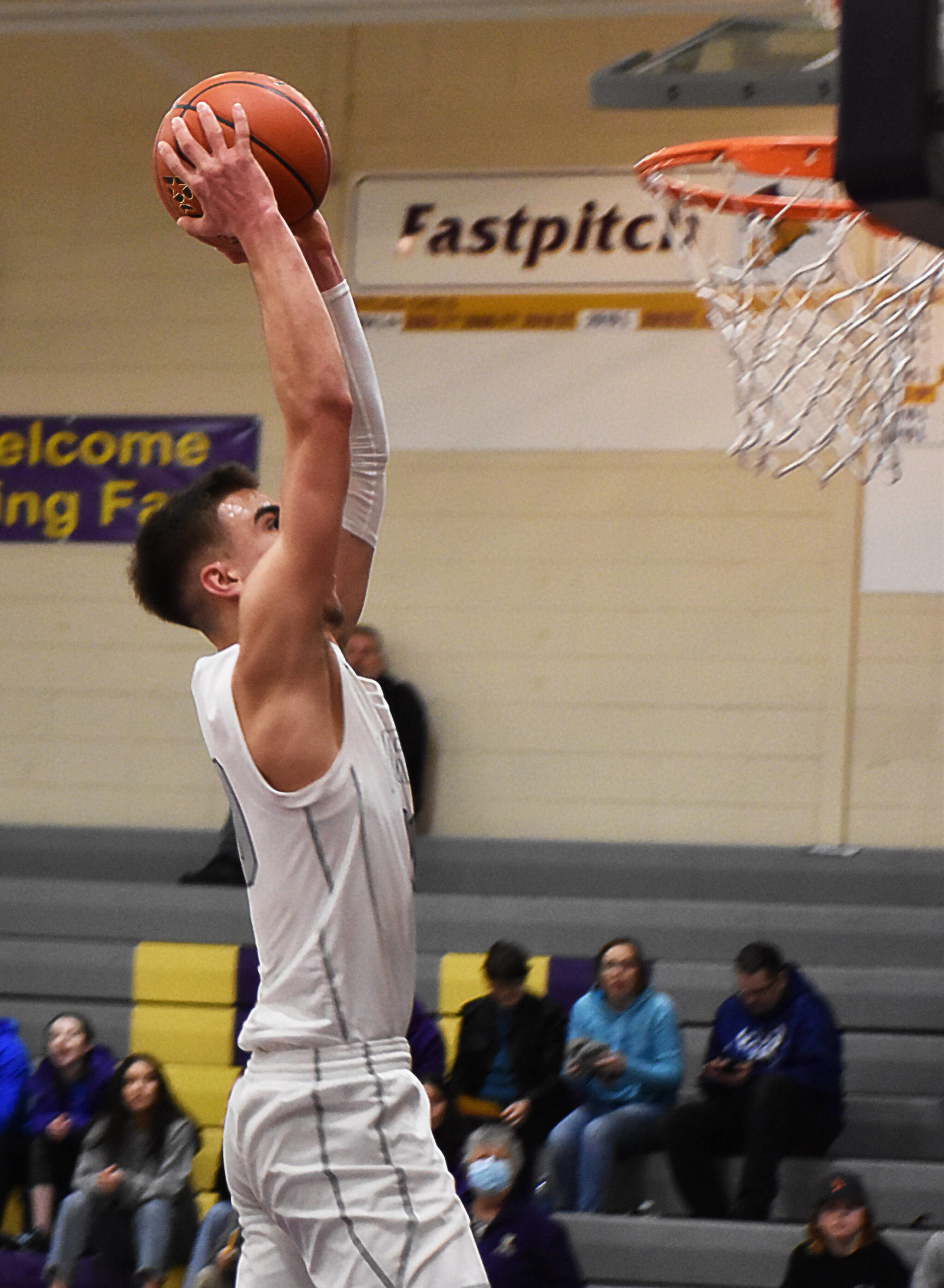 Cade Orness slams the ball into the net for two of his 19 points. Nicholas Zeller-Singh/Kitsap News Group Photos