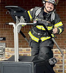Courtesy Photo
Lt. Kris Osera practices on the stairclimber at Safeway on Super Bowl Sunday.