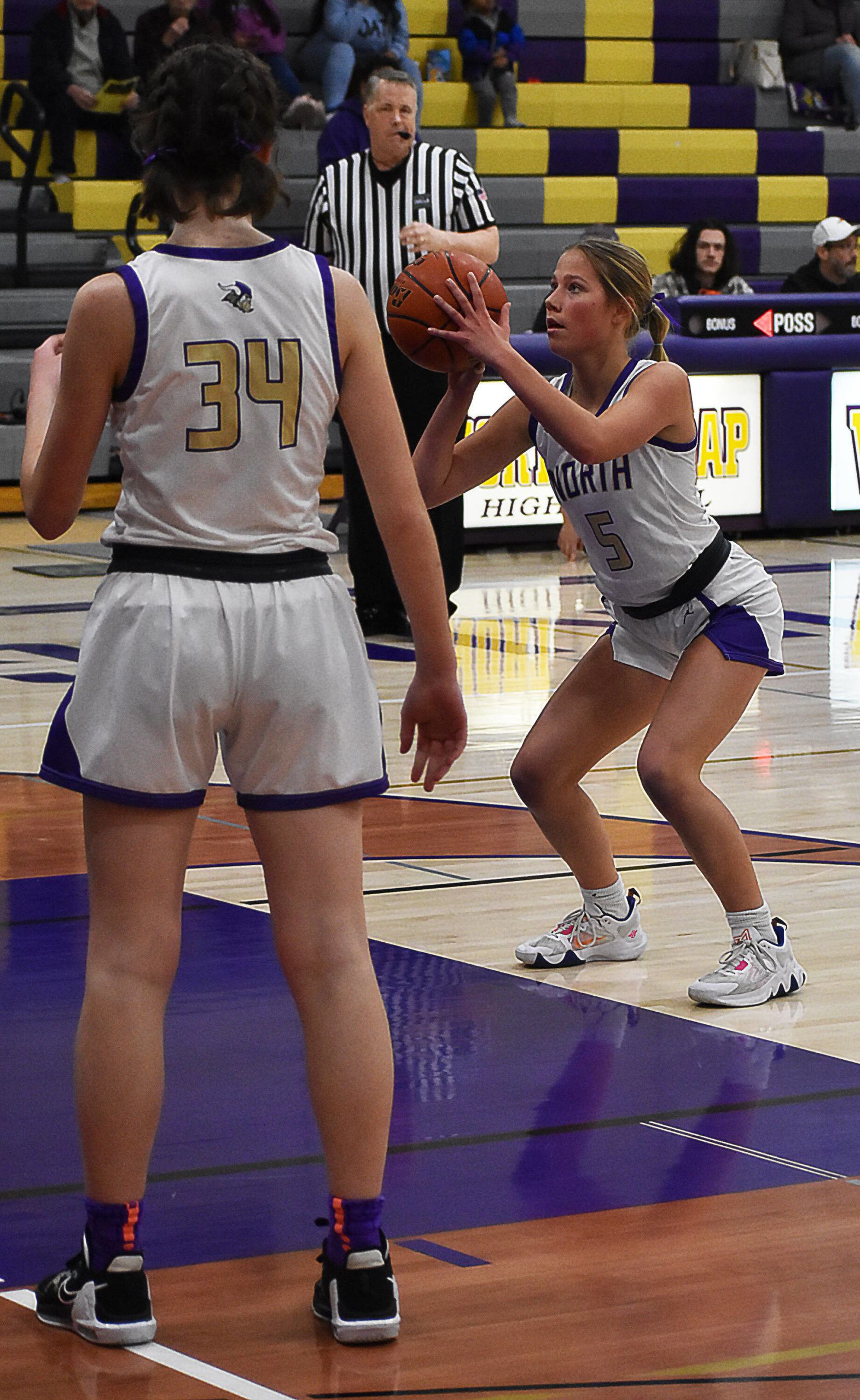 Evelyn Beers shoots a free throw while Avery Kline prepares to grab the rebound. Nicholas Zeller-Singh/Kitsap News Group Photos