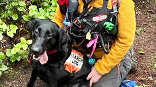 Kathy Murphy of Kingston and Bean team up to try to find missing people in Kitsap County. Mike De Felice/Kitsap News Group Photos