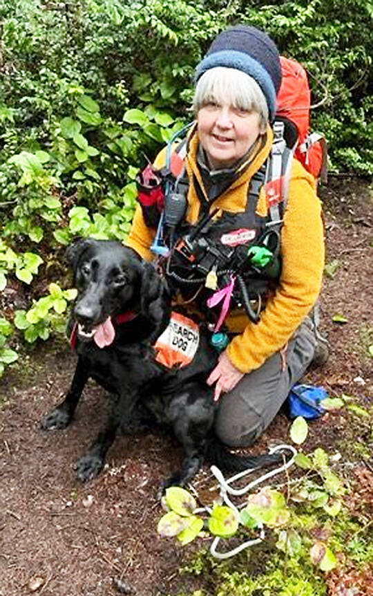 Kathy Murphy of Kingston and Bean team up to try to find missing people in Kitsap County. Mike De Felice/Kitsap News Group Photos