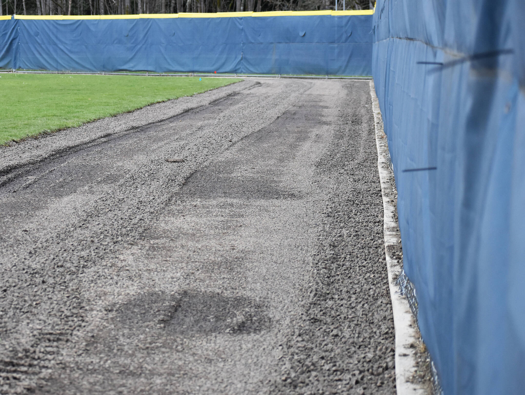 Bainbridge baseball is planning to add a rock warning track in the outfield.