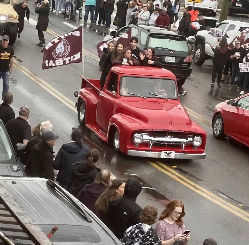 Students wave from the back of a truck to their supporters along Bay Street. Photos courtesy of Eric Worden
