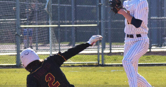 Bainbridge’s Braden French gets the force out at second base. Nicholas Zeller-Singh/Kitsap News Group Photos