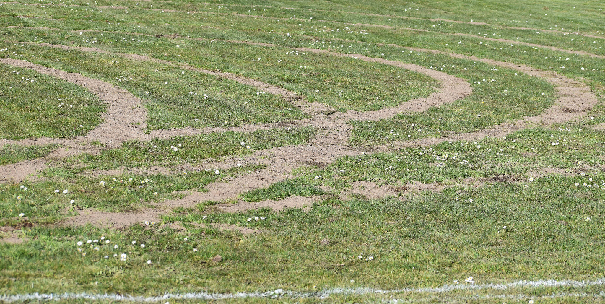 Kingston’s softball field was partially ruined by a car driving through the outfield. Nicholas Zeller-Singh/Kitsap News Group Photos