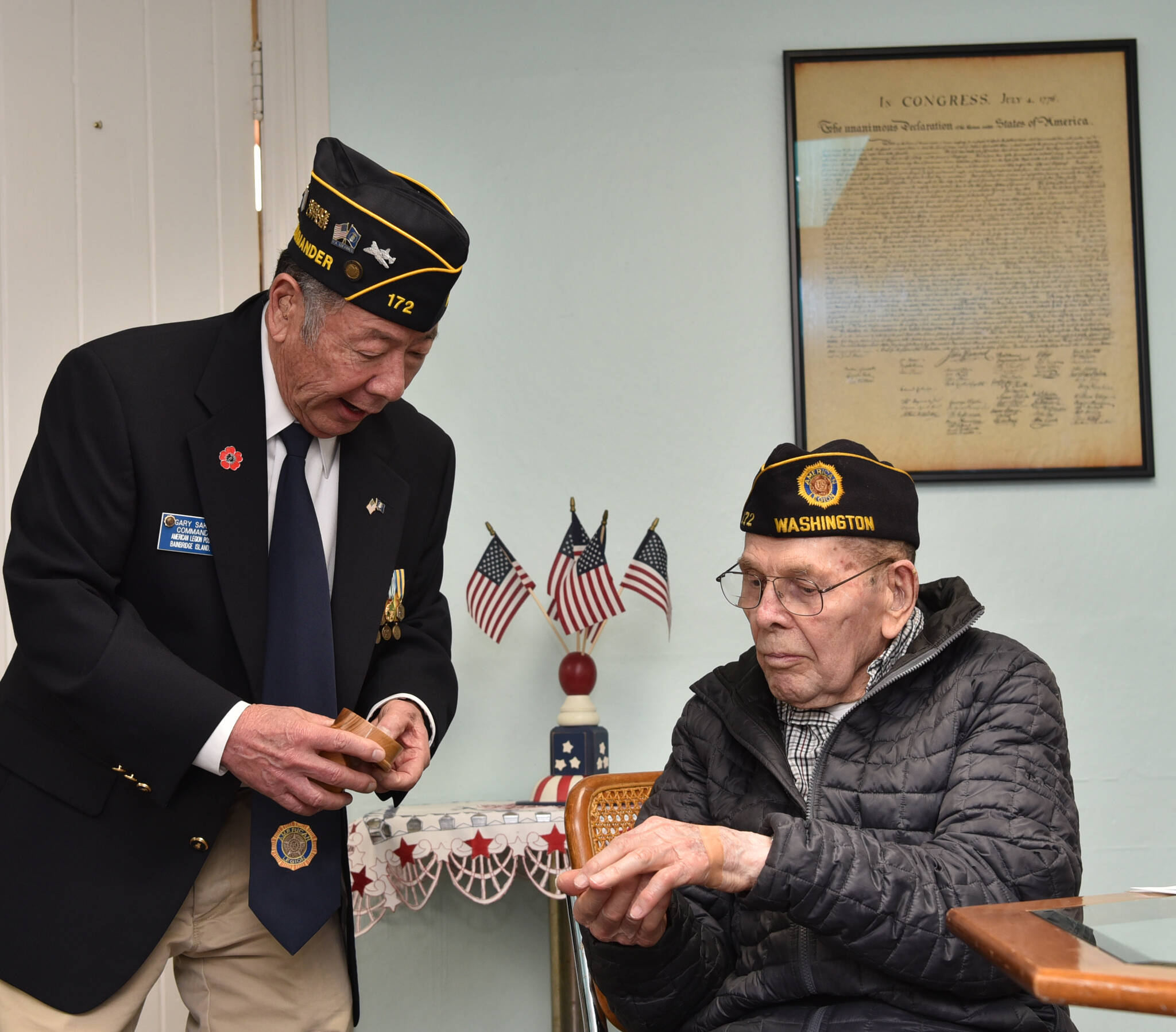 Post commander Gary Sakuma presents Young with a 70-year membership pin. Nancy Treder/Kitsap News Group Photos