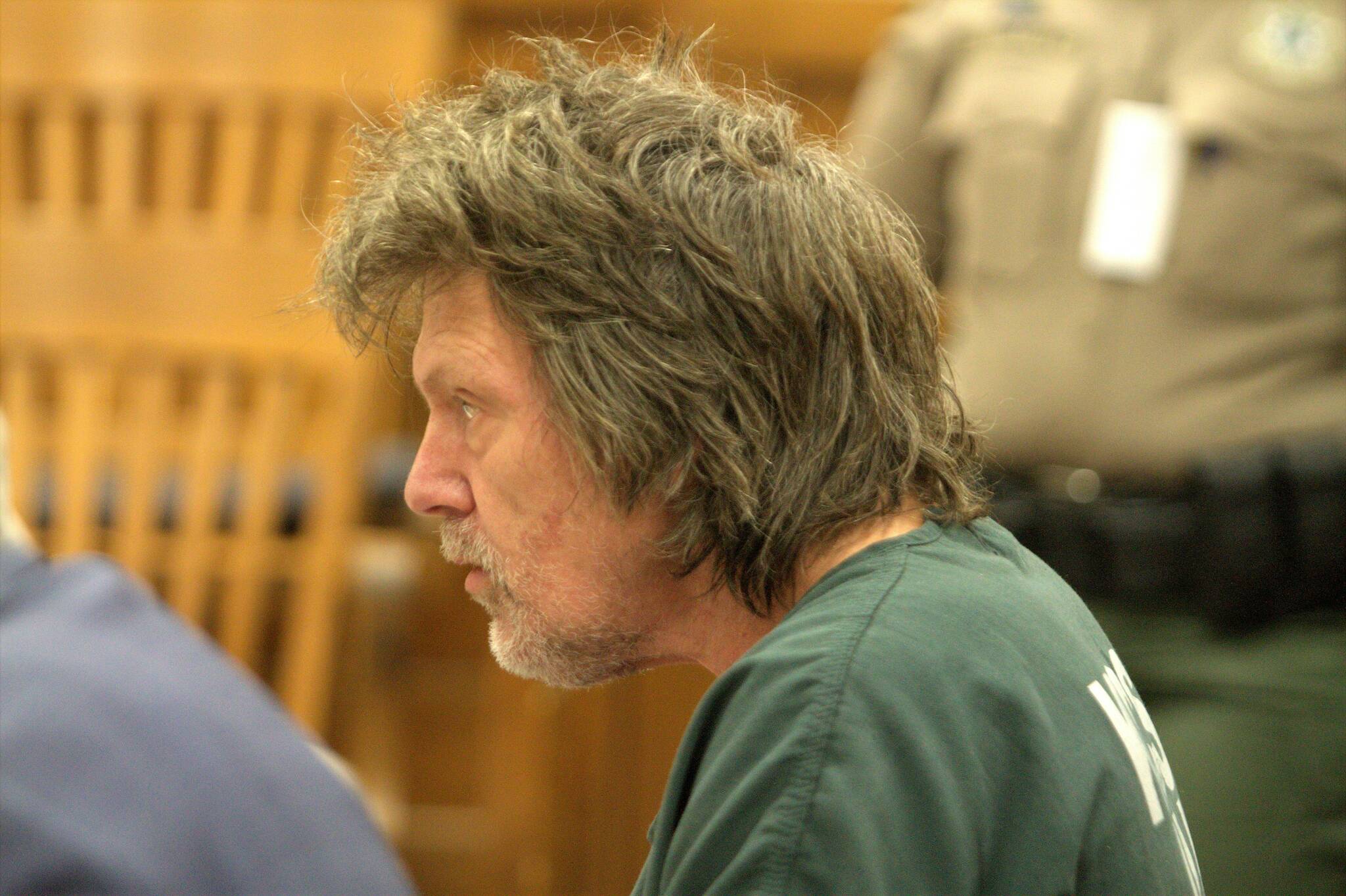 58-year-old Chet Weese listens as the report of his alleged crimes are read aloud in Kitsap County Superior Court April 10. Elisha Meyer/Kitsap News Group