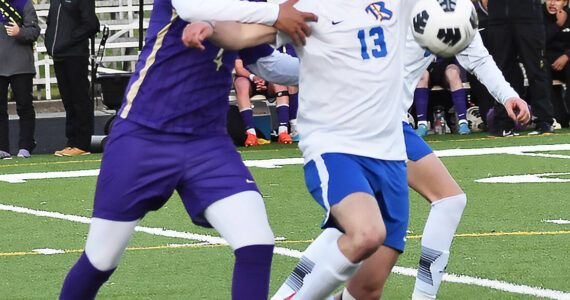 North Kitsap’s Diego DeLuna battles with Bremerton’s Silas Erwin for the ball. Nicholas Zeller-Singh/Kitsap News Group Photos