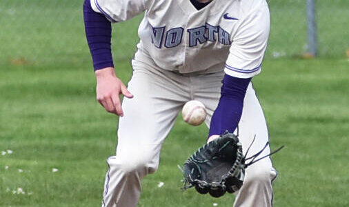 NK’s Cole Edwards forces the first out of the game. Nicholas Zeller-Singh/Kitsap News Group Photos