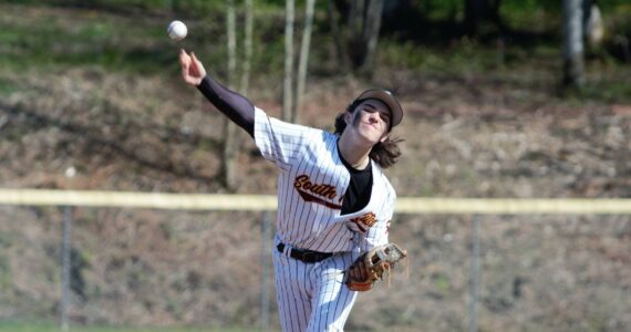 Senior Bradyn Melton delivers a pitch during the first inning of his Senior Day start against Rogers. Elisha Meyer/Kitsap News Group