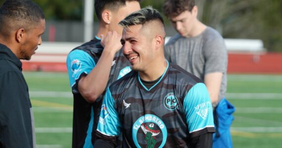 Elisha Meyer/Kitsap News Group photos
Armando Valdez tries on one of the POFC jerseys prior to a team practice at Central Kitsap High School.