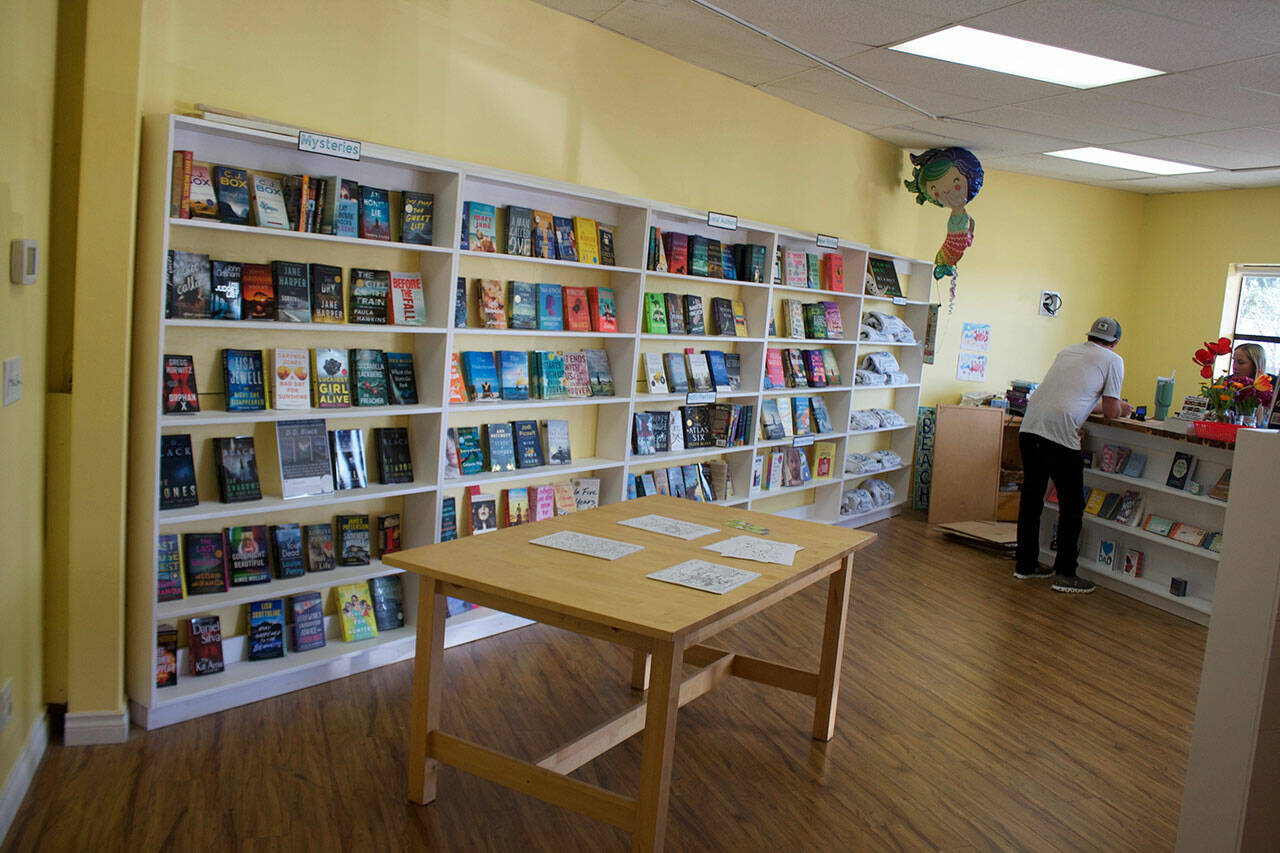 Many mystery novels are available at the store. Tyler Shuey/Kitsap News Group