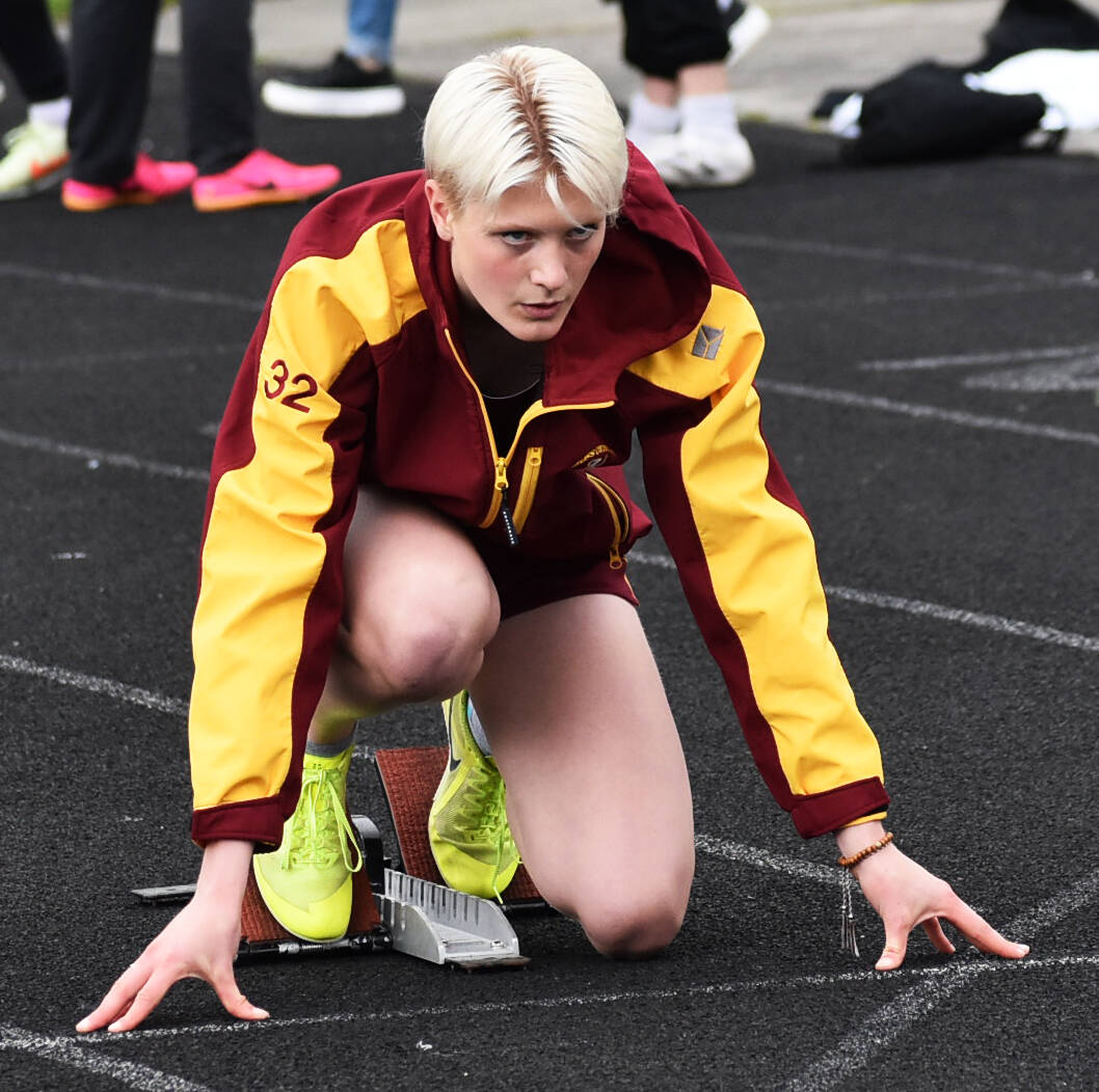 Leighton Menge dominates the hurdle events for Kingston. Nicholas Zeller-Singh/Kitsap News Group Photos