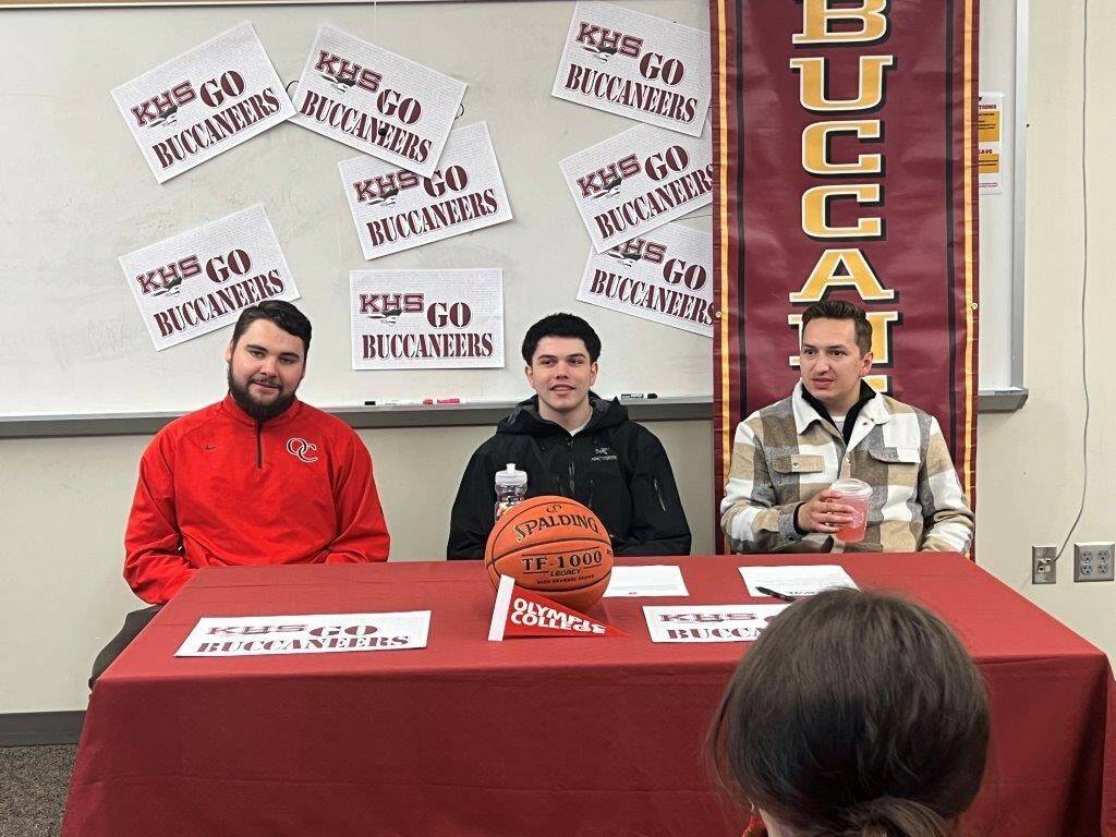 Kingston’s Dakota Standley signs his letter of intent to Olympic College to play basketball. Ed Call Courtesy Photos